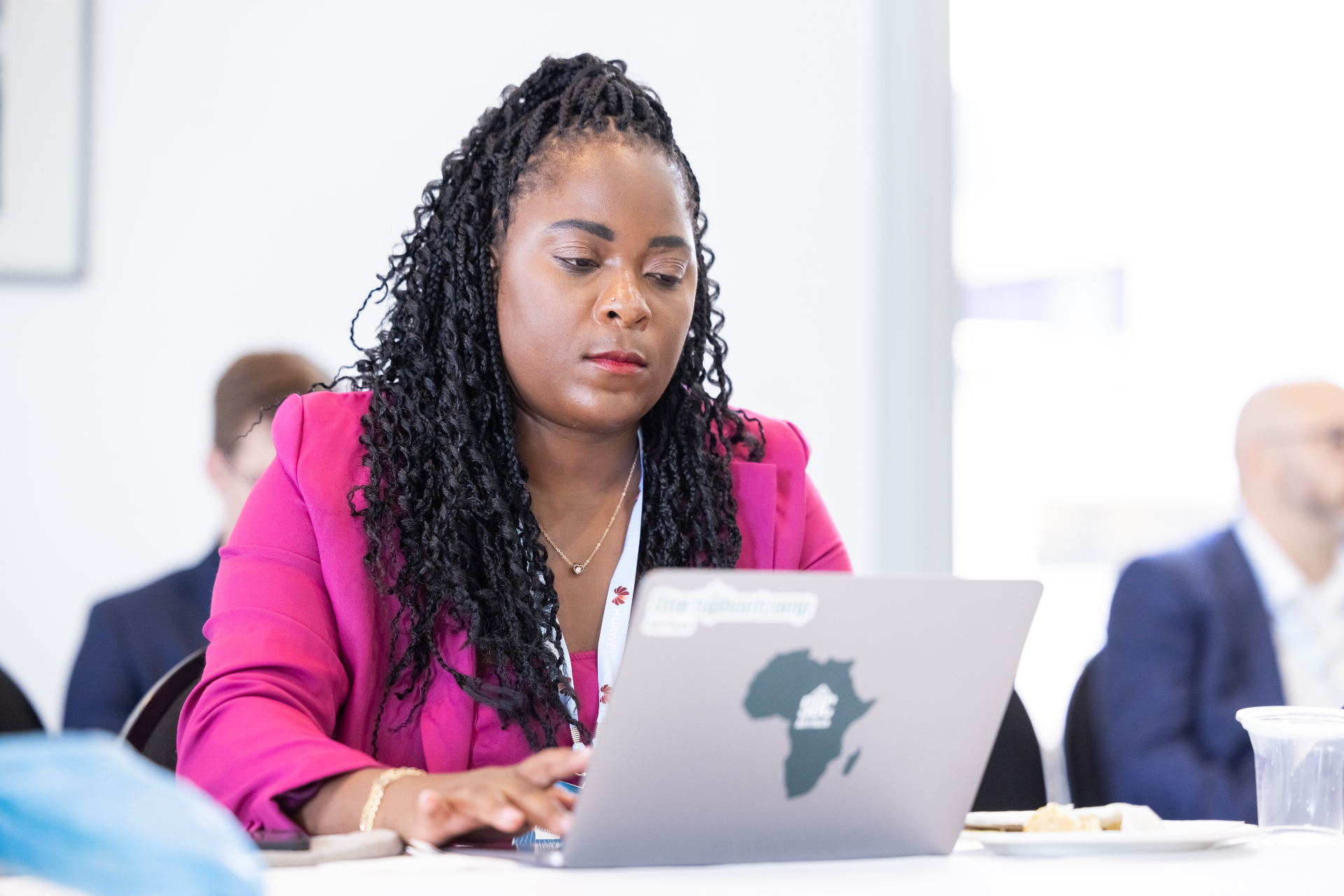 Joss Nyaguse working with a startup cohort
